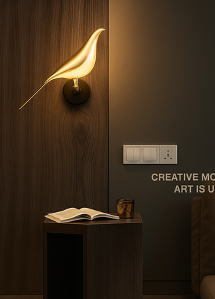 Zephyr Wing Wall Light – Sculptural Golden Bird Design.