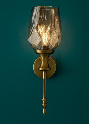 Veluna Sconce – Radiant Harmony in Amber Elegance